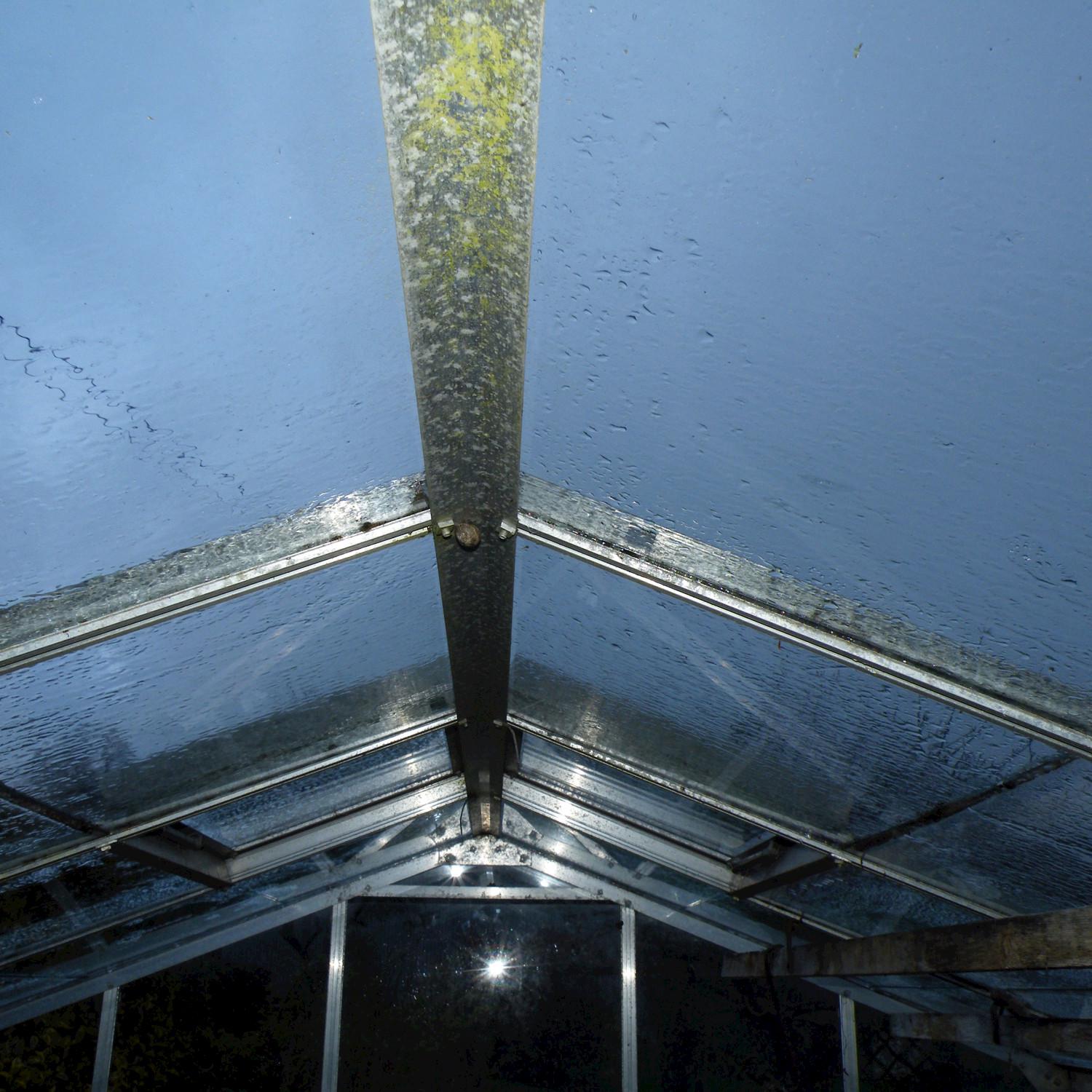 Raining On the Greenhouse Roof