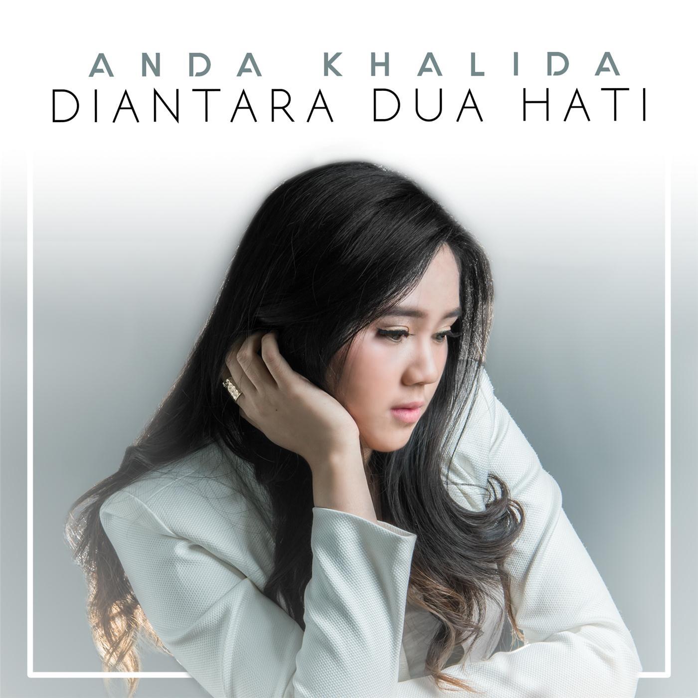 Di Antara Dua Hati